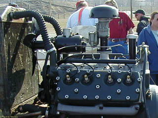 detail of 21 stud engine on test stand showing stock wire looms