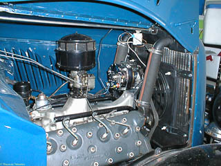 1935 Flathead engine with modern alternator and electric radiator fan