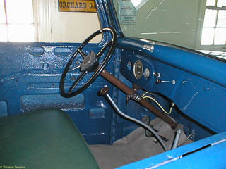 Interior of 1935 Ford pickup truck missing door panels