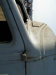 Detail of cab of 1936 Ford truck showing smooth curve where the "A" pillar meets the cowl