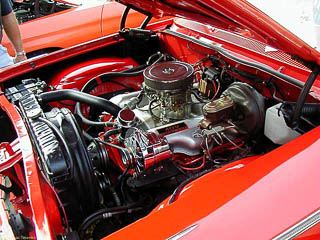 Engine bay showing the Chevrolet 409 engine