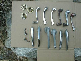 Various old Ford door and window handles
