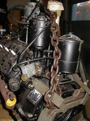 Rear of French flathead V8 showing oil filter, mechanical speed governor and revolution counter