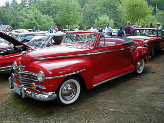 Bright red 1940's Plymouth convertible