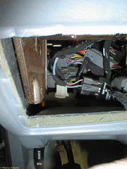 With dimmer light panel removed, you can remove the retaining clip for the parking brake release cable.