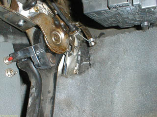 The bead at the end of the parking brake release cable put in place