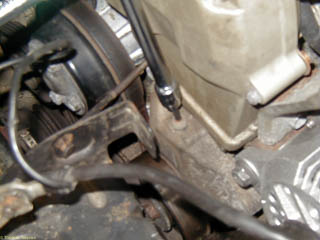 Use socket extension and 5mm hex drive to tension the belt